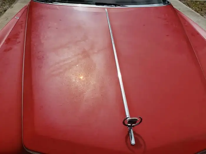 Classic Cadillac hood before detailing